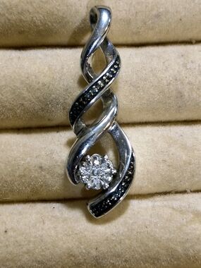 Sterling Silver And Diamond Swirl Pendant Diamonds Signed